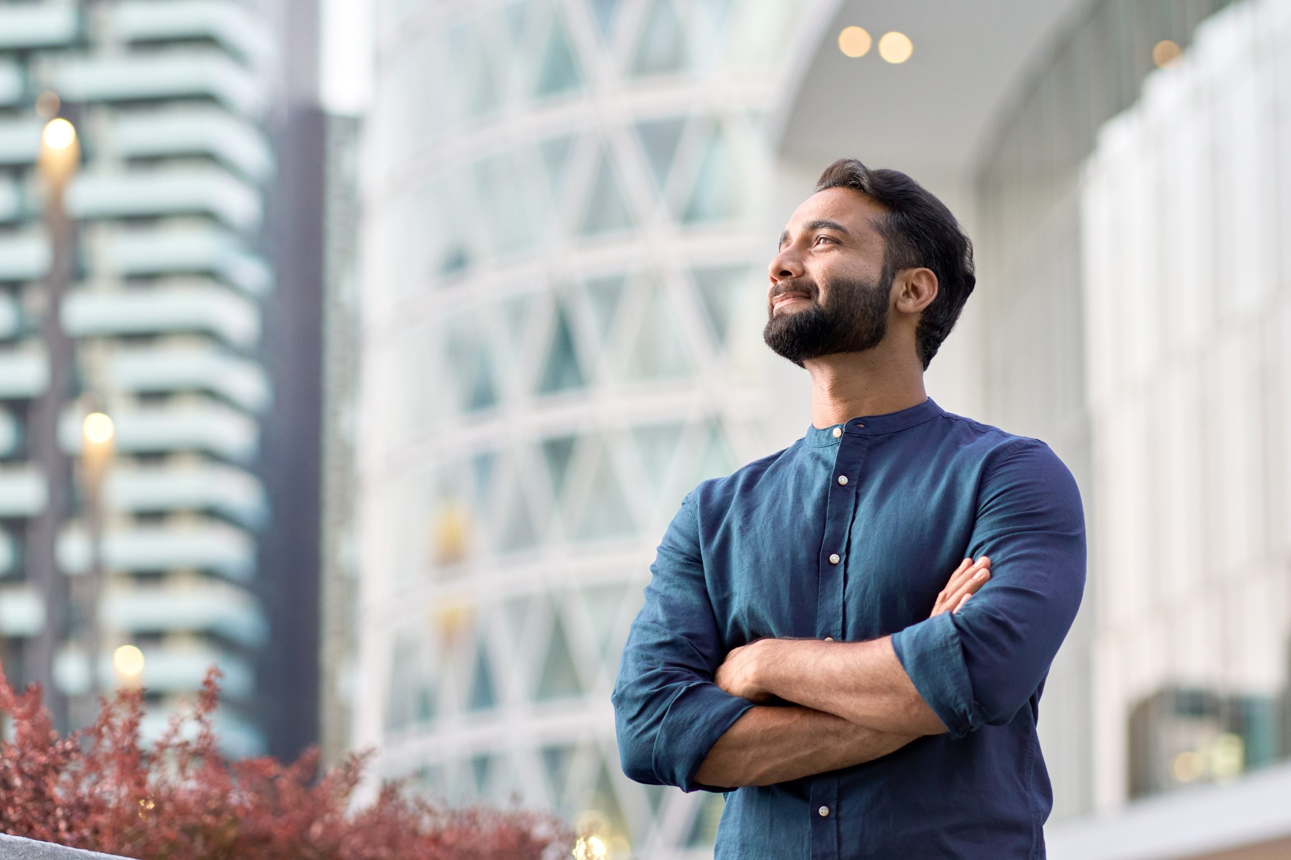 Confident,Rich,Eastern,Indian,Business,Man,Executive,Standing,In,Modern